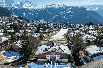 An aerial view of a ski resort with the word vip on the bottom