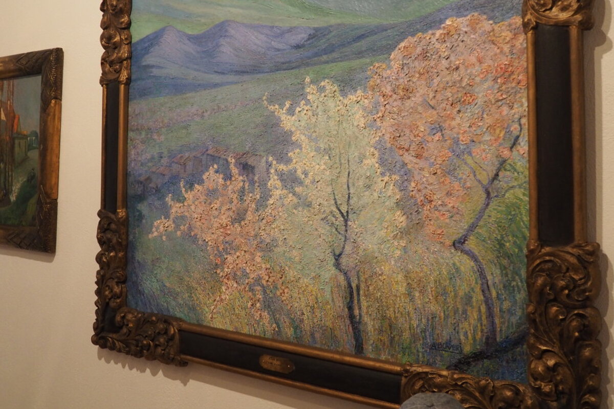 a painting of trees in a museum in mallorca
