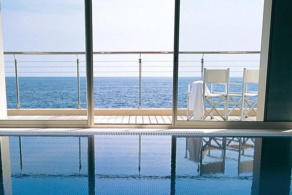 A swimming pool with a view of the ocean