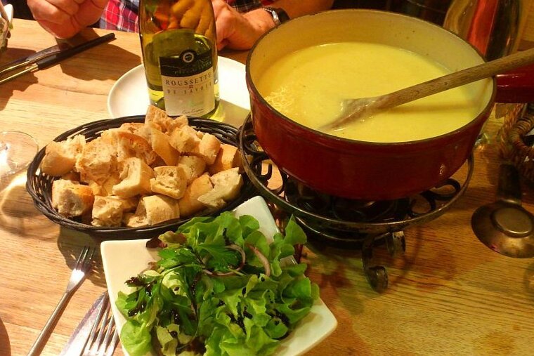 An image of a cheese fondue at a savoyarde restaurant in chamonix mont blanc