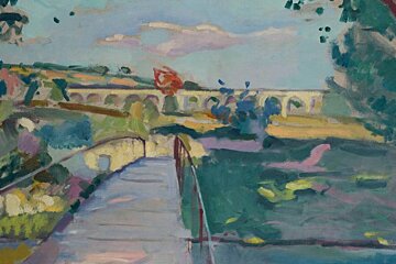 a bridge in a garden