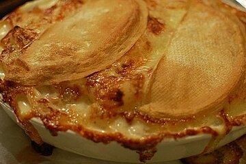 A close up of a pie in a pan on a table