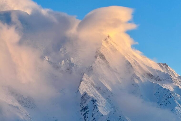 Chamonix Mont Blanc with clouds and sun
