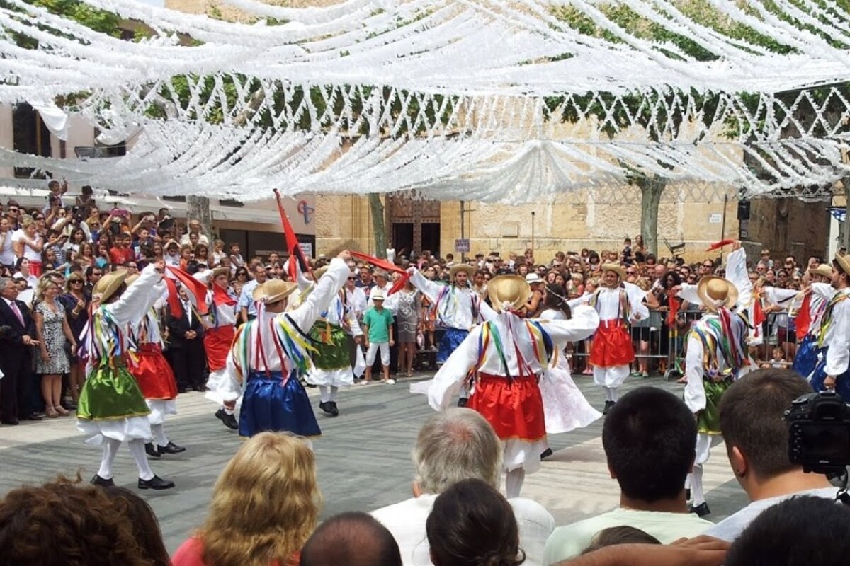morris dancers in a square in Mallorca