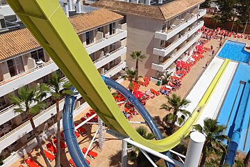 An aerial view of a water slide at a resort