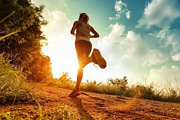 girl running towards the sun