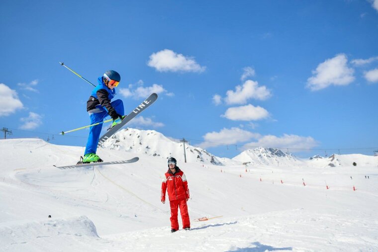 a ski instructor giving a private lesson