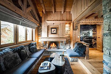 A living room with a fireplace and a couch