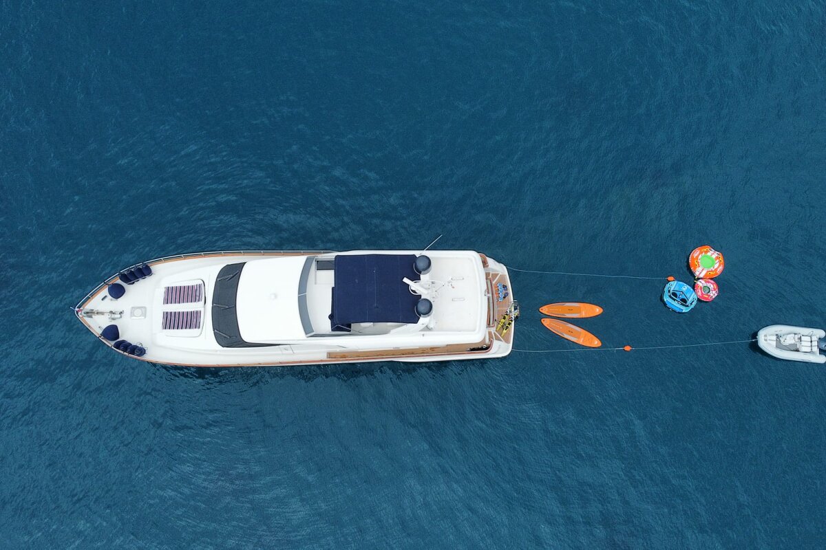 An aerial view of a boat in the ocean
