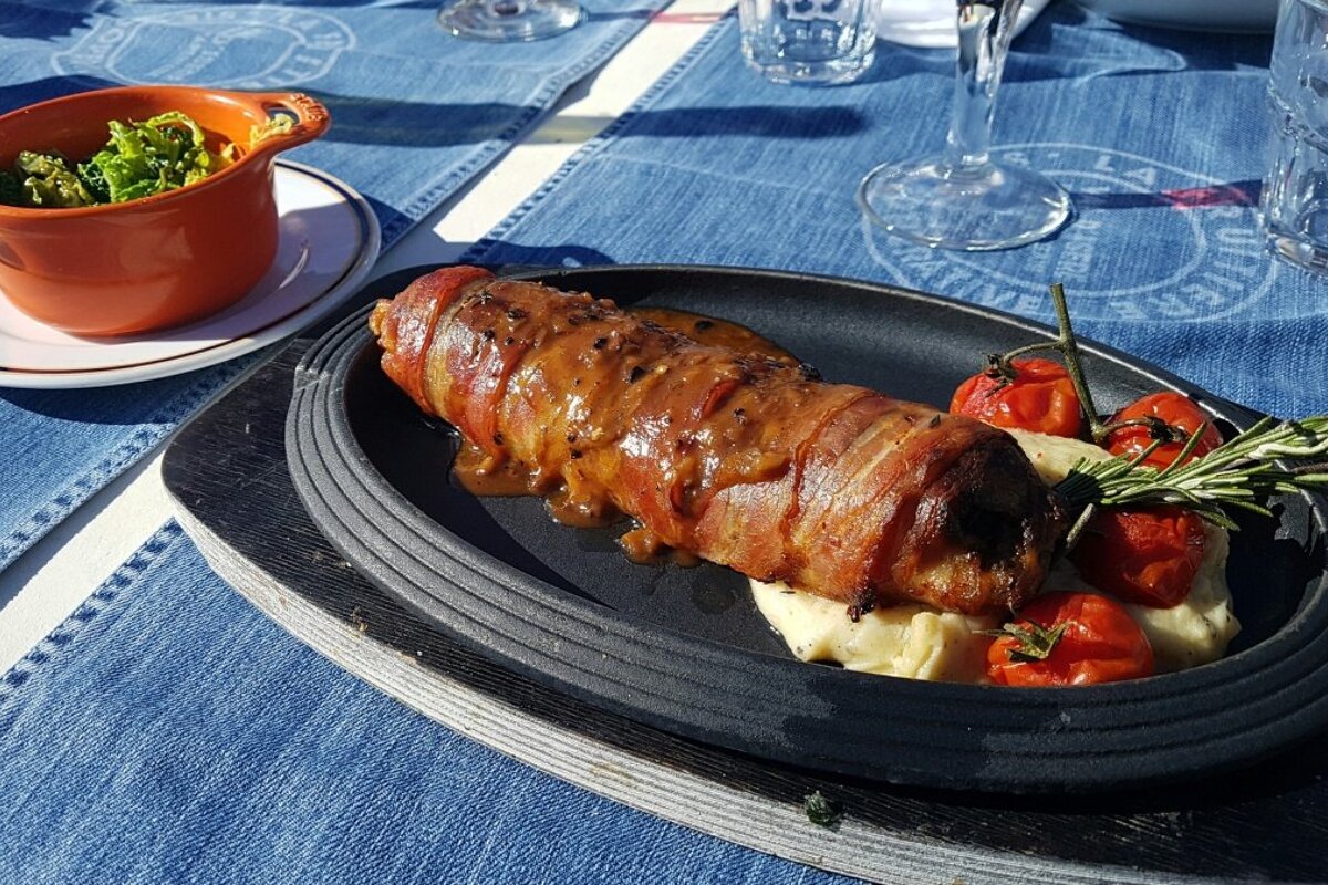 a sizzling platter of pork