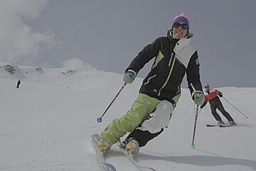 a ski instructor giving a private lesson
