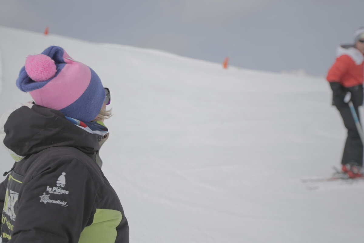 a ski instructor giving a private lesson