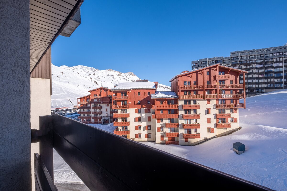 A view of a ski resort from a balcony