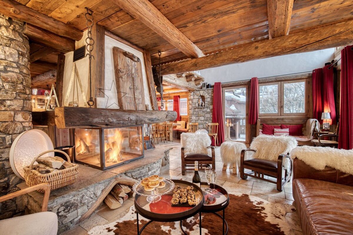 A living room filled with furniture and a fireplace