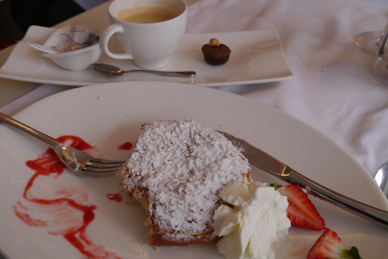 EATING A TARTE TROPEZIENNE WITH COFFEE IN ST TROPEZ