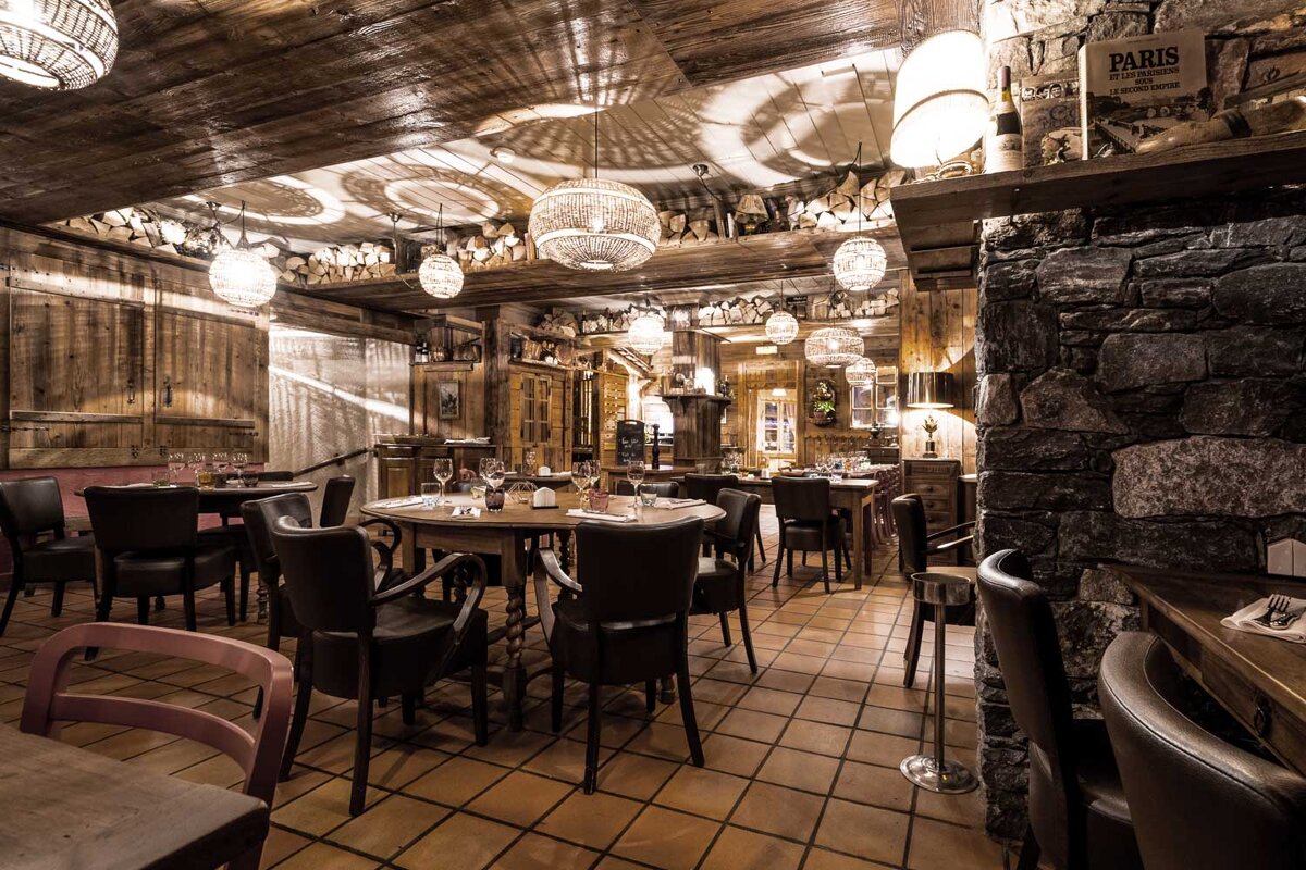 A restaurant with a bottle of paris on the shelf