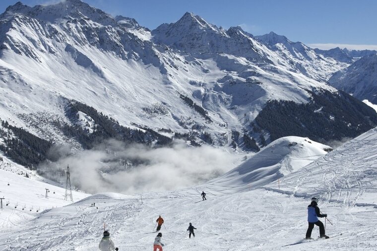 people skiing in switzerland