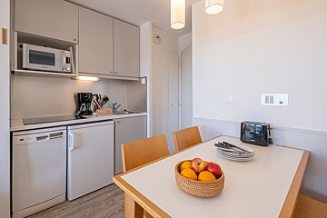 A kitchen with a toaster that says ' siemens ' on it