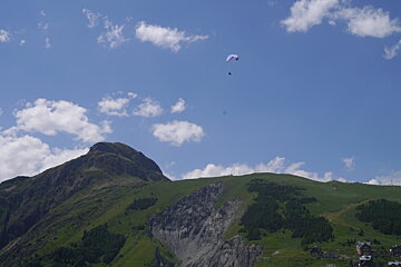 paraglider high above the ground