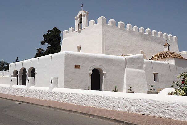 the exterior of the whitewashed church of sant jordi ibiza