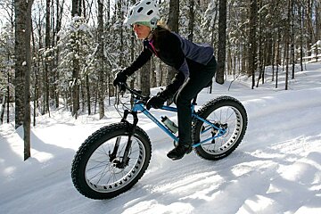 a woman on a fat bike MTB
