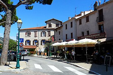 some shops and a street in a town in Nice