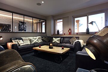 A living room with a couch that has the number 3 on it