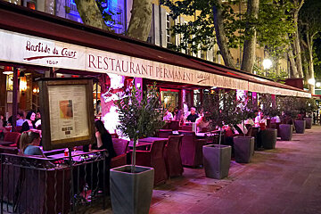 a restaurant at night on the cours mirabeau