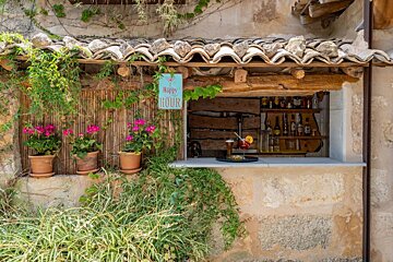 A bar with a sign that says happy hour