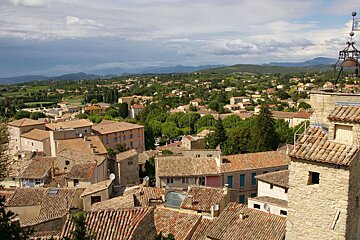 A tower with a bell on top of it that says ' a ' on it