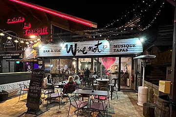 The outside of a restaurant called wine not