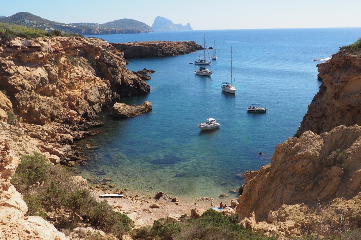 the bay of cala llentia with es vedra in background