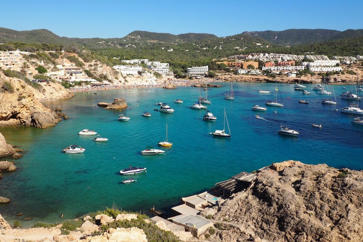 Looking down to the boats in the water of cala tarida