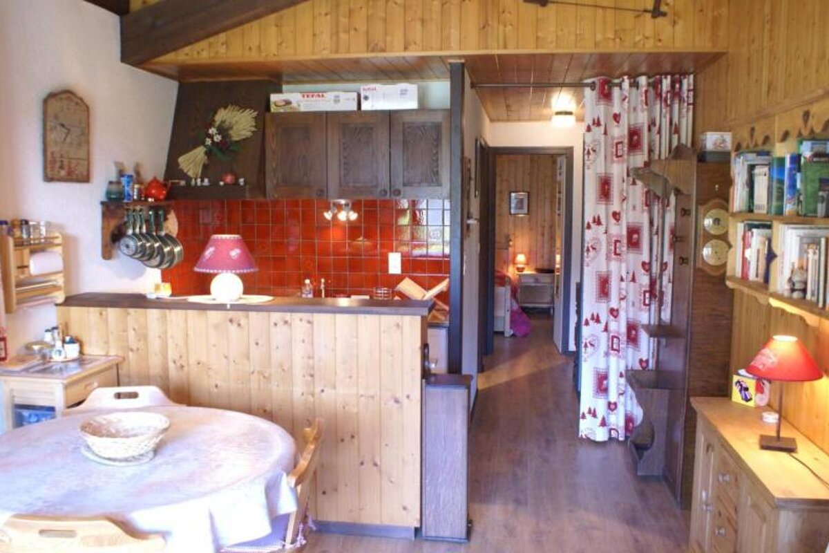 A kitchen with a box that says tefal on it