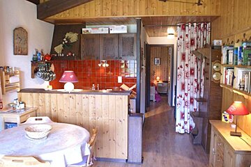 A kitchen with a box that says tefal on it