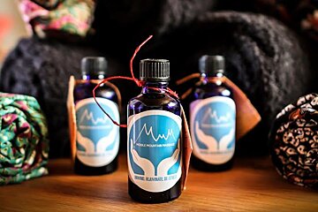 three bottles of oil