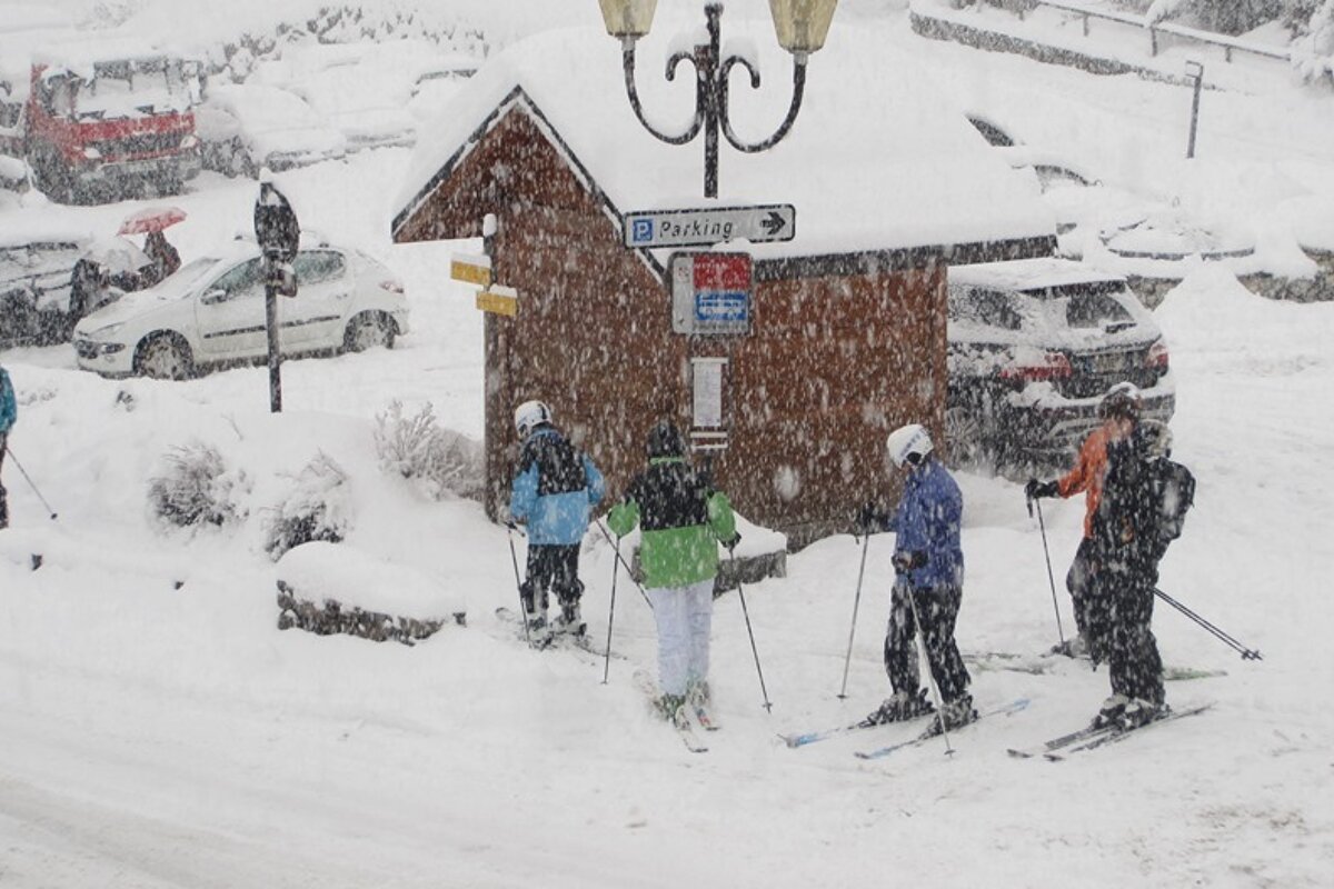 skiers on the road