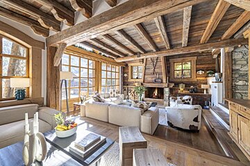 A living room filled with furniture and a fireplace