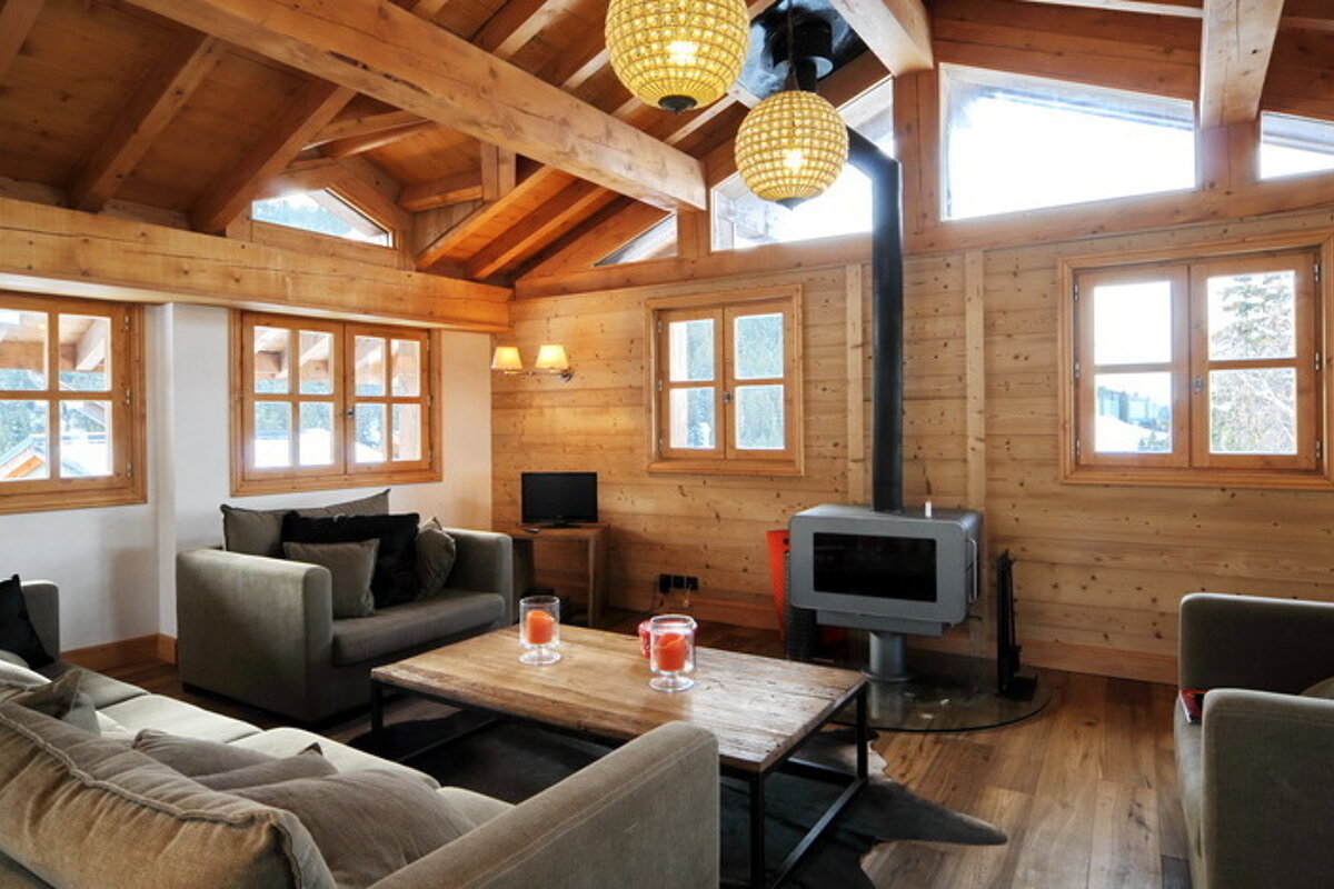 A living room filled with furniture and a fireplace