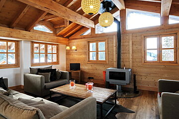 A living room filled with furniture and a fireplace