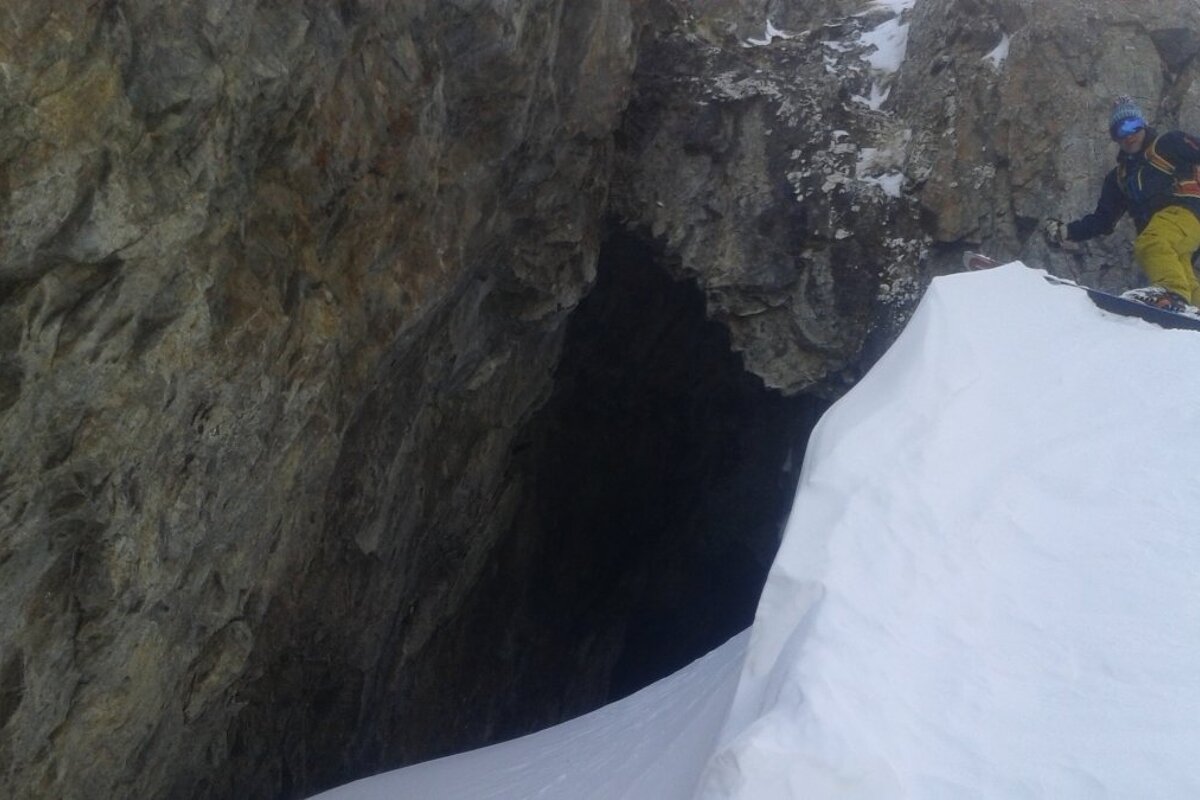 a skier near a cave
