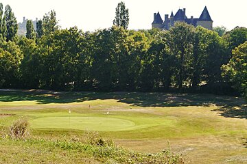 golf course with chateau Montal in background