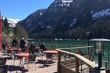 a lake side restaurant terrace