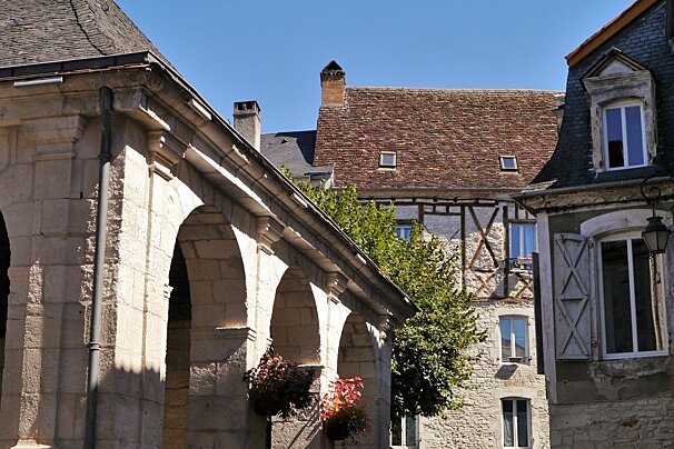 the old halle and other medieval buildings in souillac