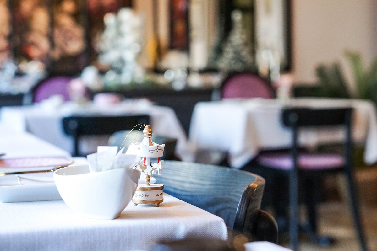 A small carousel on a table in a restaurant