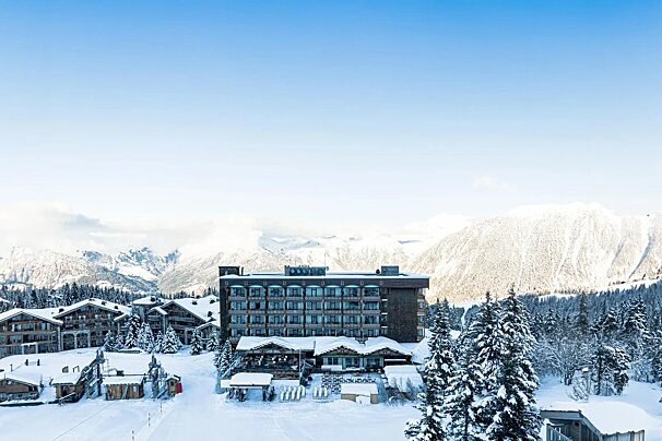 Exterior of hotel in Courchevel in the snow