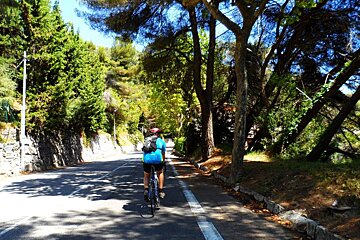a woman cycling in Nice