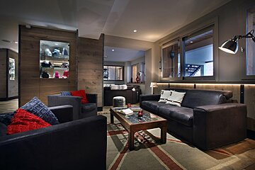 A living room with a couch that has the number 3 on it