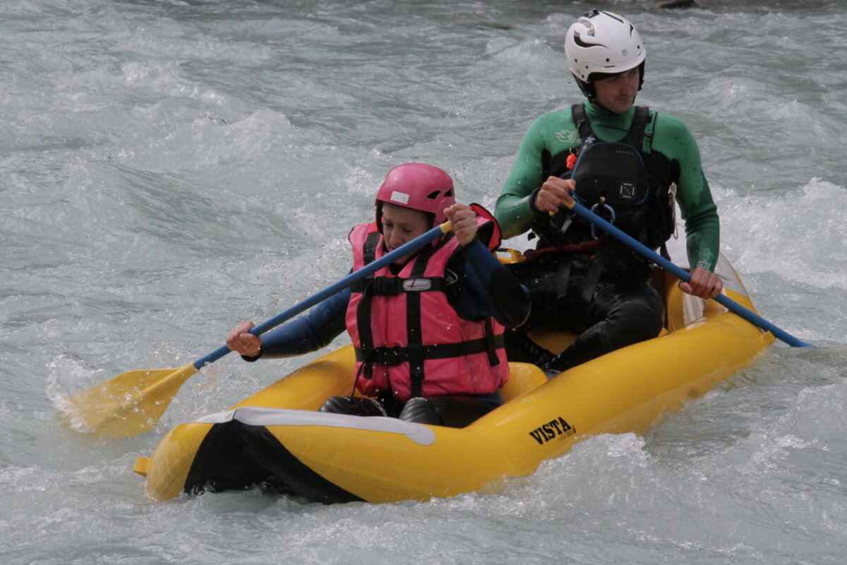 two person white water rafting
