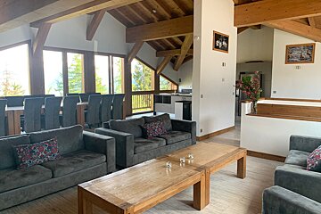 A living room with a couch and a coffee table